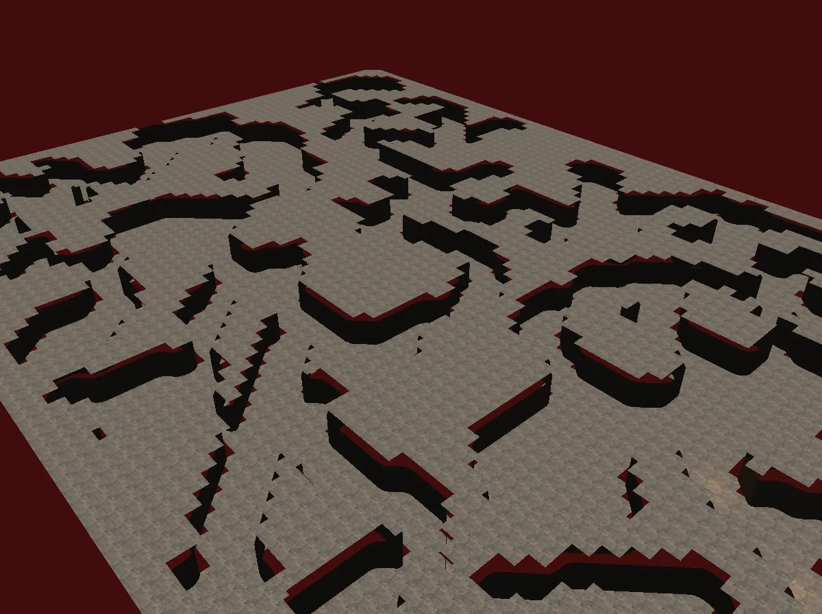 A generated cave seen from above in VenRad: stone floor and walls raised from the grid